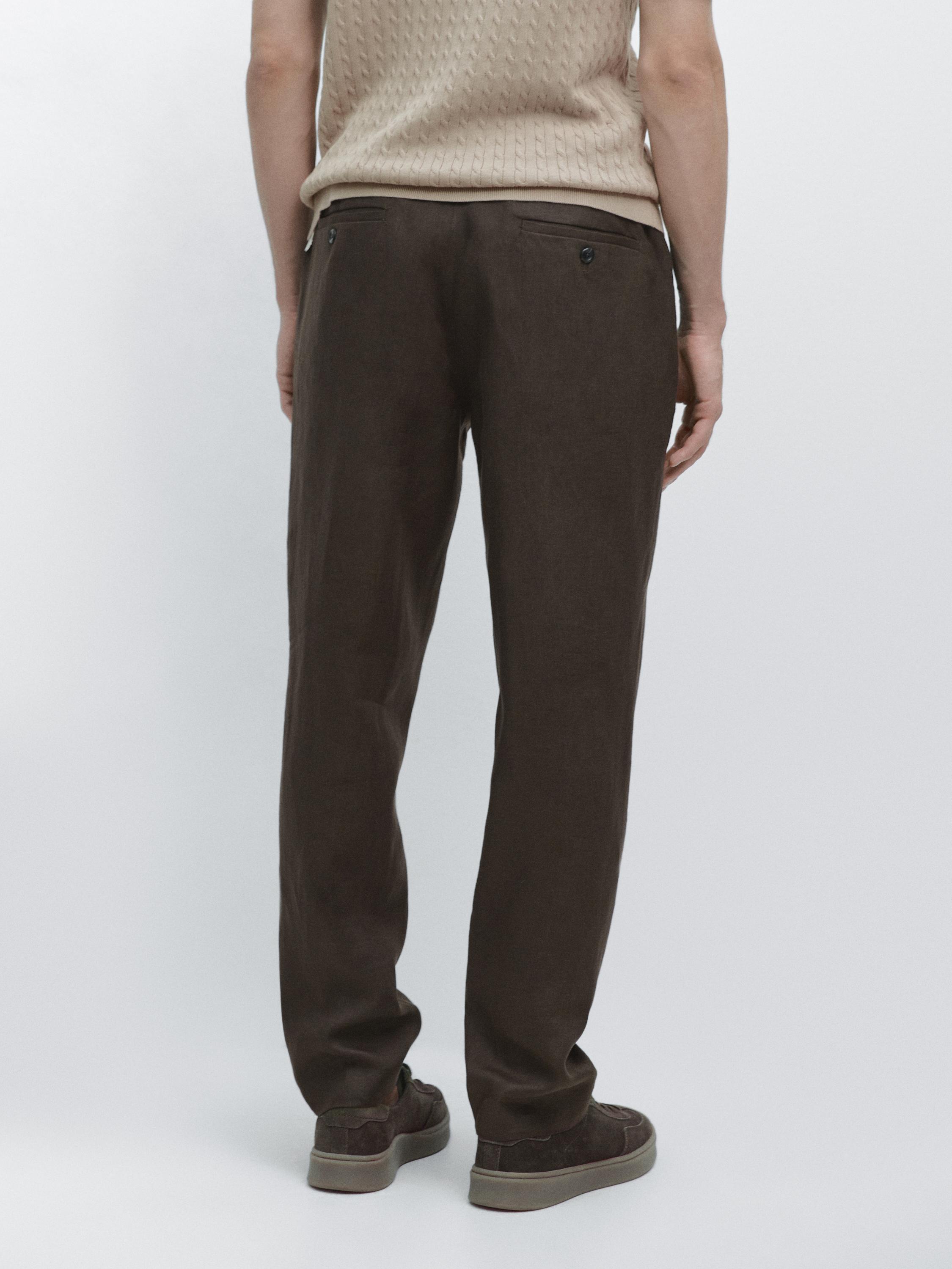 Tapered fit linen trousers
